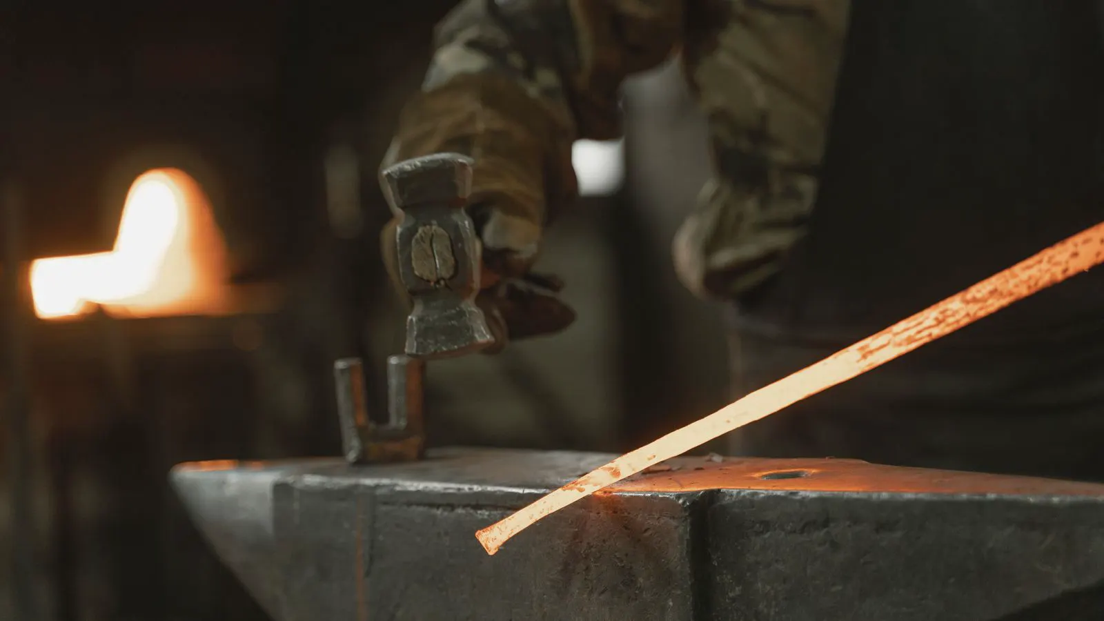 Stack of forged alloy steel ingots on a mill floor