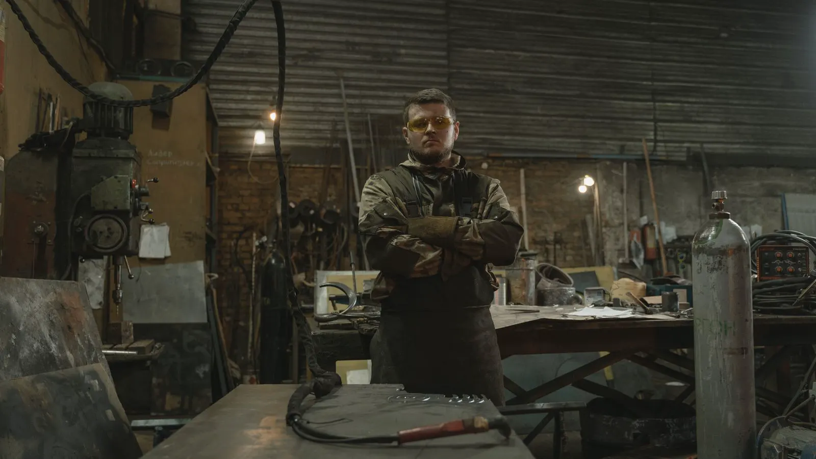 Industrial forging workshop with metal processing equipment